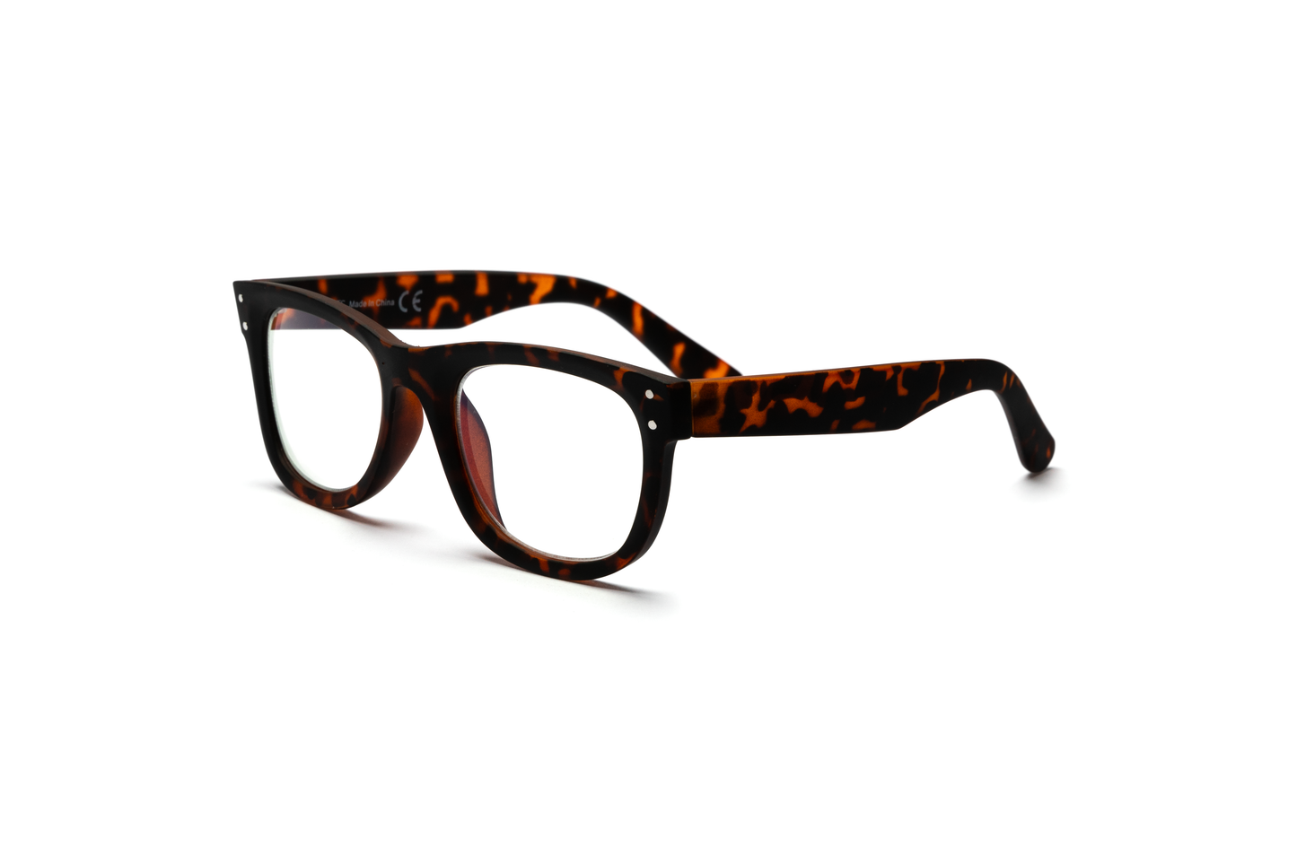 Matte tortoise wayfarer reading and blue light glasses displayed on a white background, showcasing the classic shape and rubberized texture for a modern, masculine look.