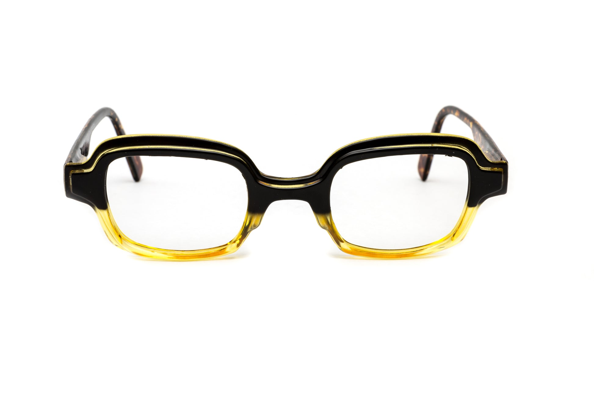 Square funky unisex reading glasses in striking yellow with stylish animal print details. These designer reading glasses feature a contemporary frame, blending bold colors and trendy patterns, perfect for fashion-forward individuals seeking a unique accessory for reading and everyday wear