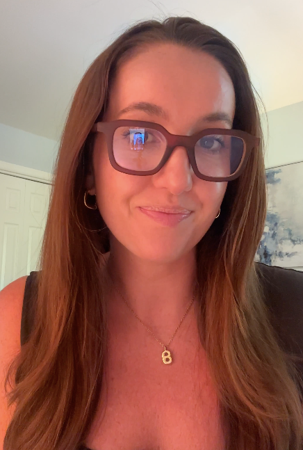 influencer wearing brown square glasses for screen time and computer