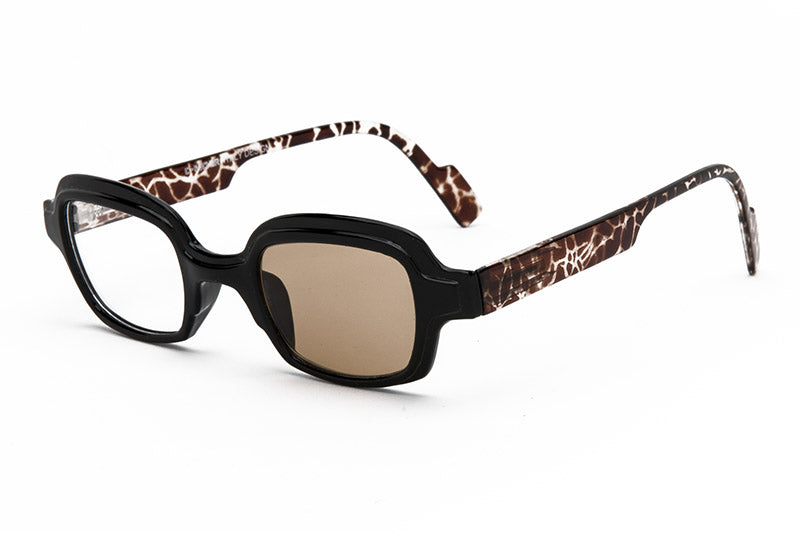 Funky square reading glasses with a black frame and tortoise sides